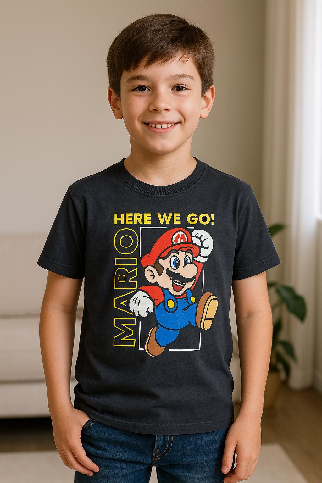 Child wearing a black t-shirt with a Mario graphic and text indoors.