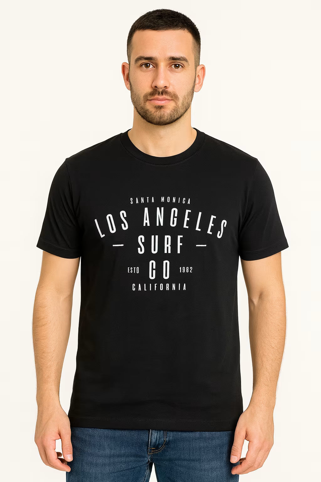 Man wearing a black t-shirt with 'Los Angeles Surf Co' text on a white background